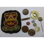 A People's College Masonic cloth badge, two Internationale Sechstagefahrt badges, 1934 and 1935,