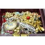 A jewellery case and vintage costume jewellery