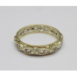 A 9ct gold, silver and white stone eternity ring,