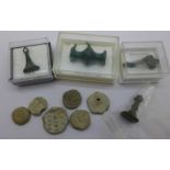 A collection of medieval artifacts, brooches, etc.