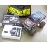 A Tamiya remote control model Bush Devil monster truck,