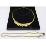 A Monet gold plated necklet and a string of faux pearls with silver clasp