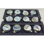 A set of twelve commemorative mechanical pocket watches depicting WWII aircraft