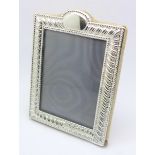 A silver fronted photograph frame, 13cm x 9.