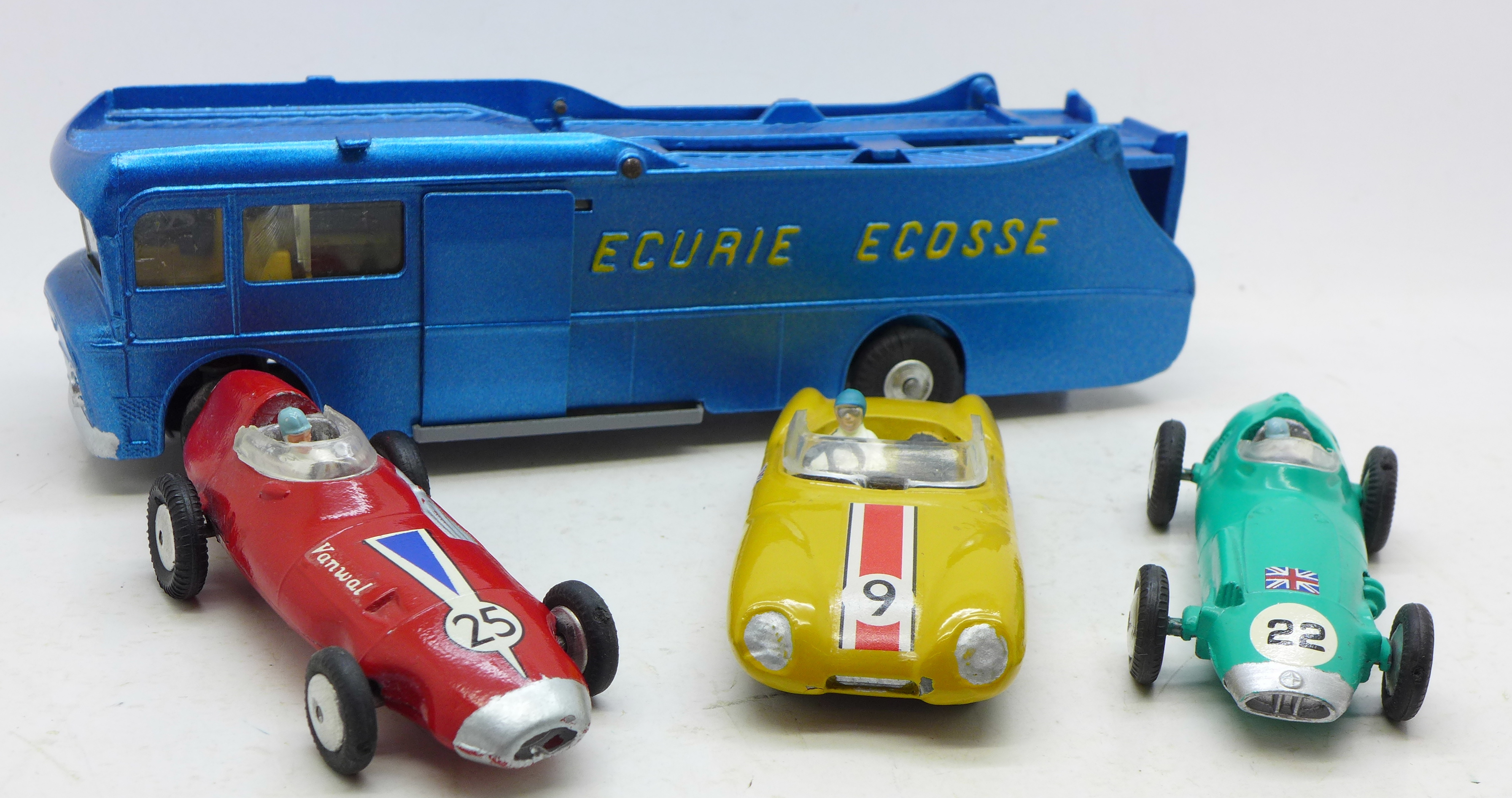 A Corgi Major Toys Ecurie Ecosse racing car transporter and three racing cars including Lotus mark