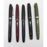 Five 14k gold nib ink pens including Parker and Waterman