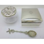 A silver cigarette box,