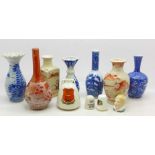 Seven small oriental vases,