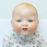 A bisque head Armand Marseille baby doll,