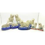 Two pairs of Staffordshire dogs and two pairs of Staffordshire sheep