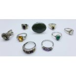 A silver and 18ct gold mounted ring, an opal set ring and eight other rings, (8 silver,