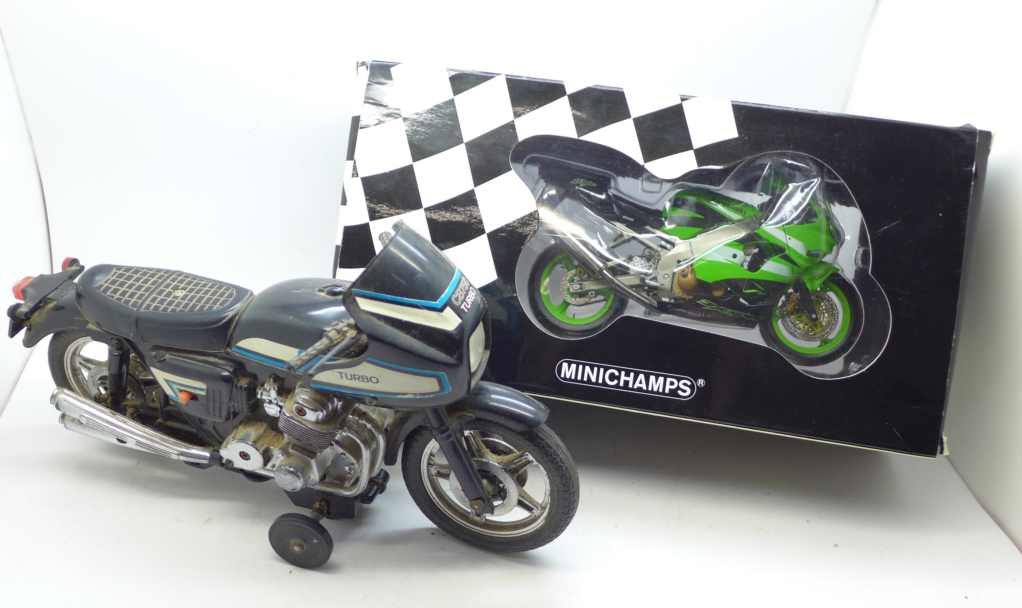 A Minichamps model Kawasaki NInja, boxed, and one other motorcycle, CB750,