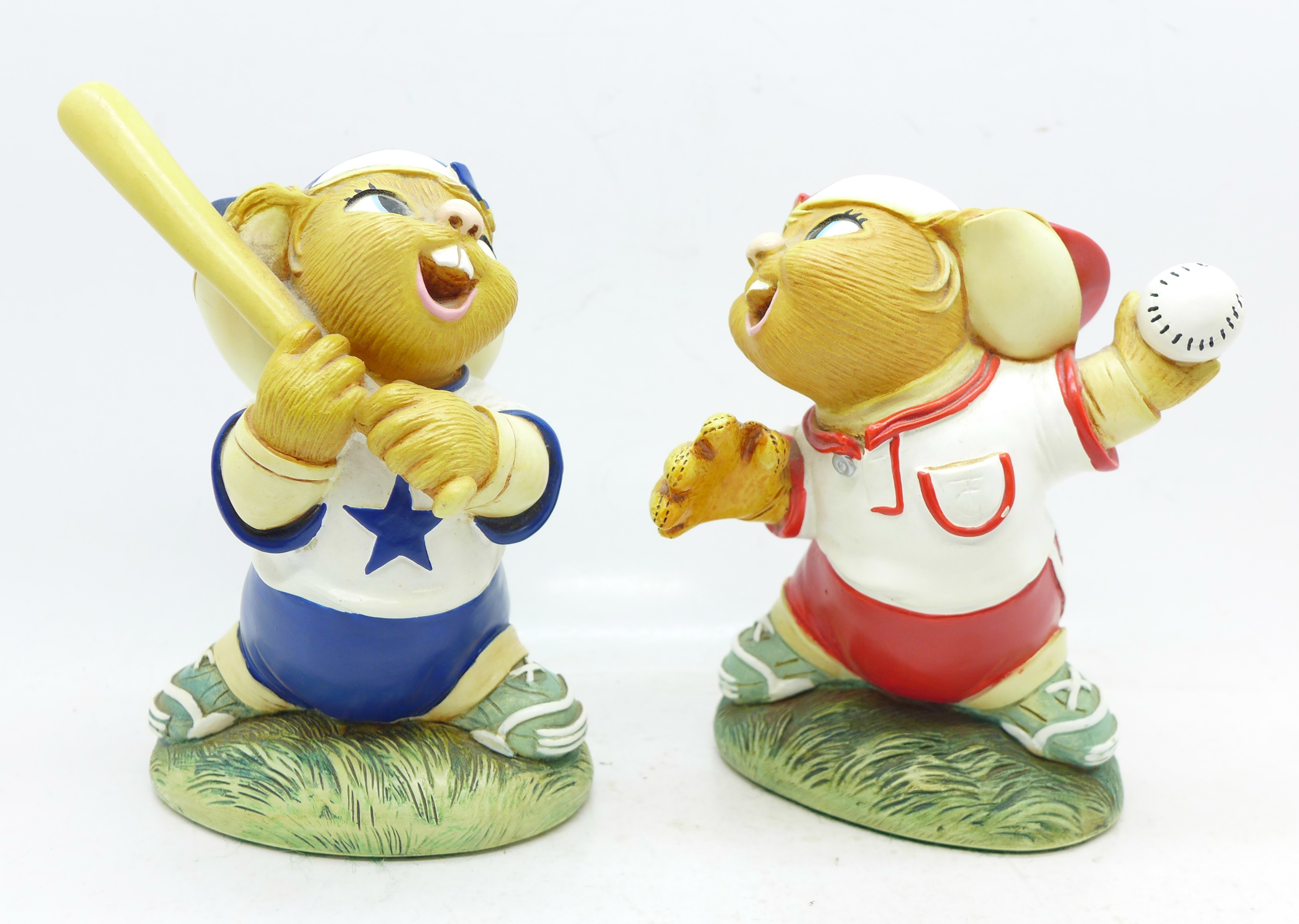 A pair of Pendelfin baseball figures,