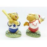 A pair of Pendelfin baseball figures,