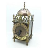 A Smiths brass lantern clock