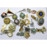 Thirty-four costume brooches