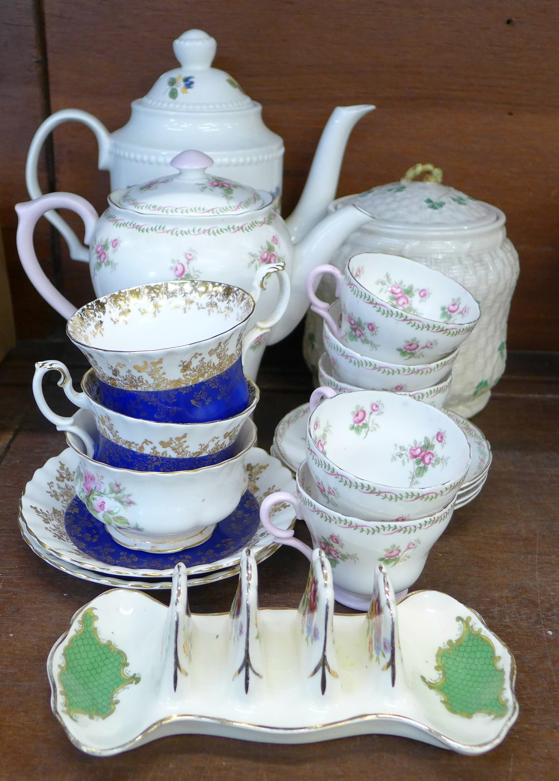 A Shelley coffee pot, five cups and four saucers, two Royal Albert cups and saucers,