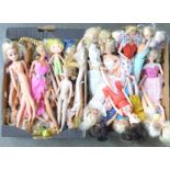 A box of six vintage Sindy and eight Barbie dolls, 1970/80's,