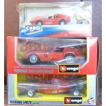 A Corgi Ferrari 308, two Burago Ferraris, 250GT0 and F1,