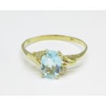A 9ct gold, blue stone and diamond ring, 1.