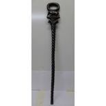 An African carved walking stick,