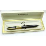 A cased Sheaffer snorkel pen with 14ct gold nib,