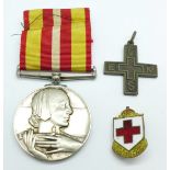 A Red Cross 'Voluntary Medical Service Medal' with ribbon,