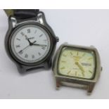 A gentleman's ceramic Tissot wristwatch and a gentleman's Seiko 5 day date quartz wristwatch