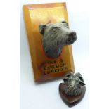 A lurcher wall plaque and one other
