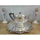 A pair of Walker & Hall silver plated candlesticks,