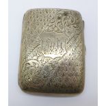 A silver cigarette case,