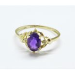 A 9ct gold, amethyst and diamond ring, 1.