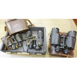 Three pairs of binoculars,