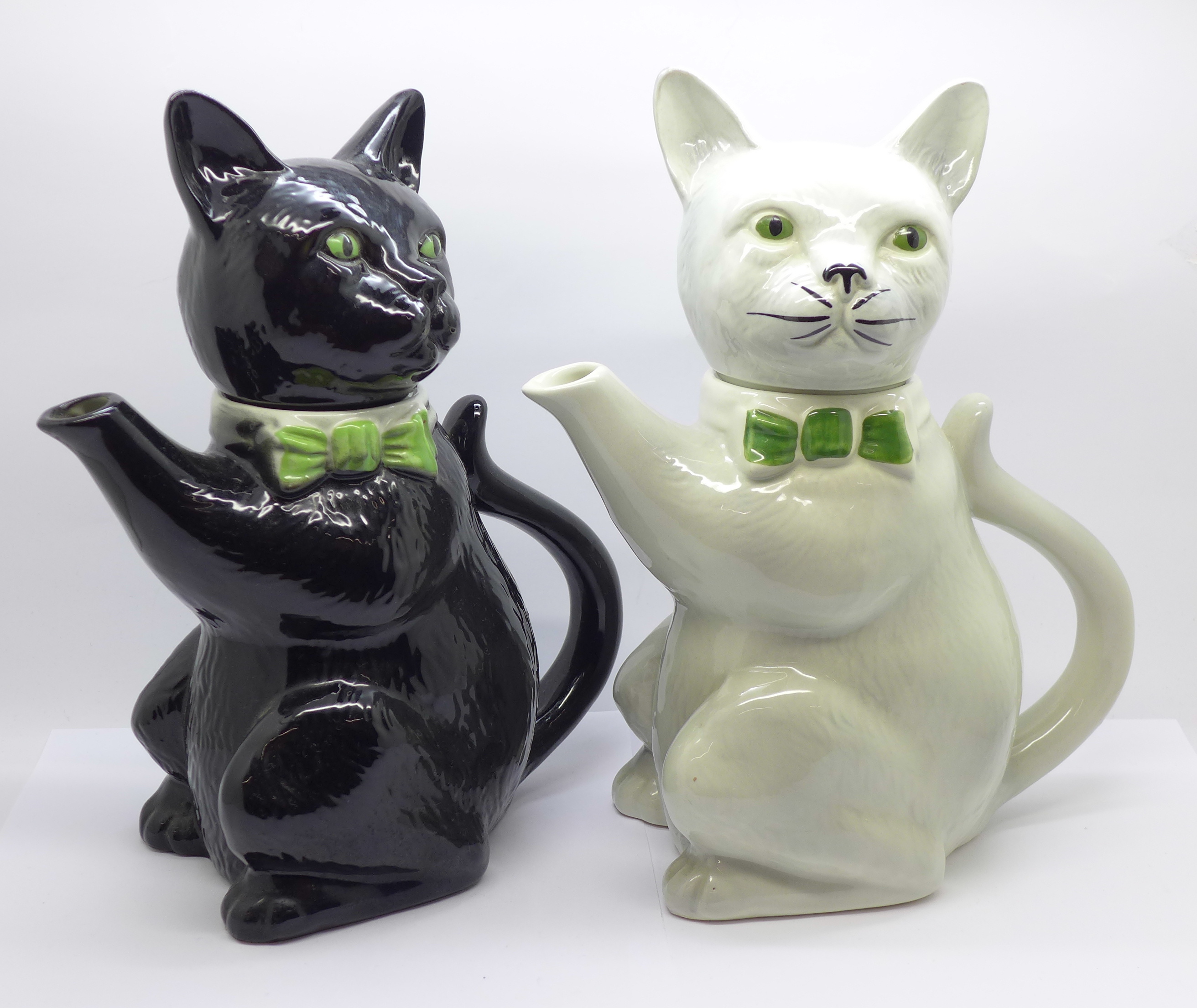 Two Tony Wood cat teapots