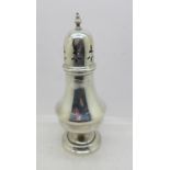 A silver sugar shaker,