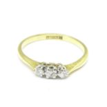 An 18ct gold diamond trilogy ring, 2g,