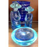 A Venetian glass bowl and two oriental figures,