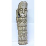 An African Lega bone tribal carving,
