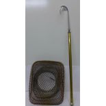 An extendable brass salmon gaff and an eel trap