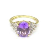 A silver gilt amethyst and topaz ring,