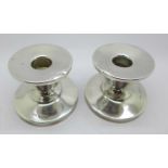 A pair of silver candlesticks, S Blanckensee & Son,