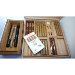 A part box of Balmoral Dominican Selection cigars (16) and one other cigar box containing a pack of