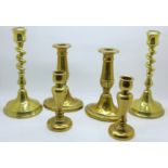 Three pairs of brass candlesticks