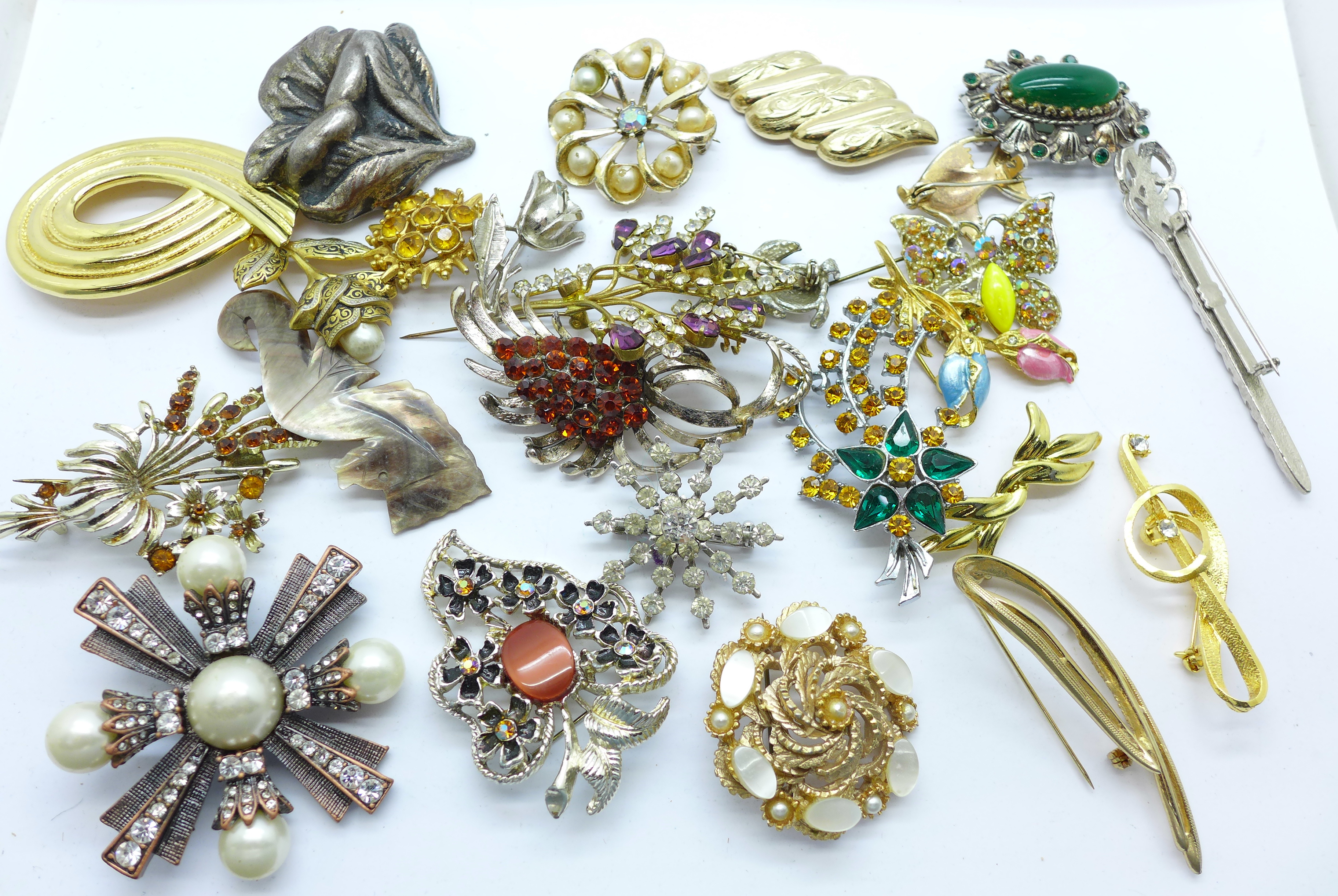 Twenty-five brooches