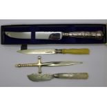 A Victorian silver and mother of pearl butter knife, one other knife with Victorian silver blade,