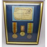 WWI medals and a George VI coronation medal, 129631 Dvr. E. Holden. R.A.