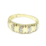 A 9ct gold ring set with fifteen diamonds, 2g,