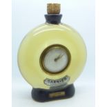 A novelty decanter clock