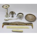 A silver vase, a Victorian silver salt, a small silver dish, etc.