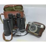 A Yashica camera in a Voigtlander case and a pair of Carl Veitch 20x50 binoculars